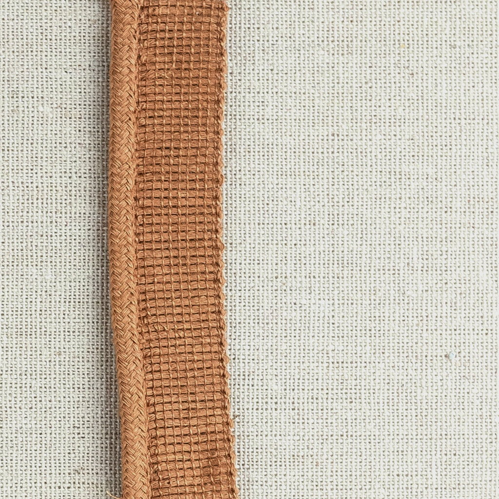 _010 | talan camel - ann rees: A rich camel-colored linen cord trimming, perfect for adding a warm and elegant touch to your home decor.